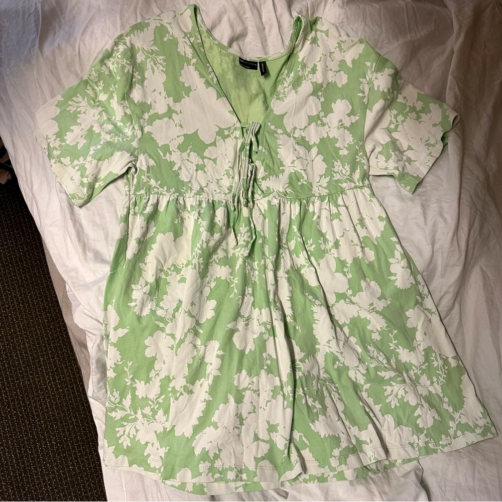ASOS DESIGN mini smock dress with double tie detail in green and white floral